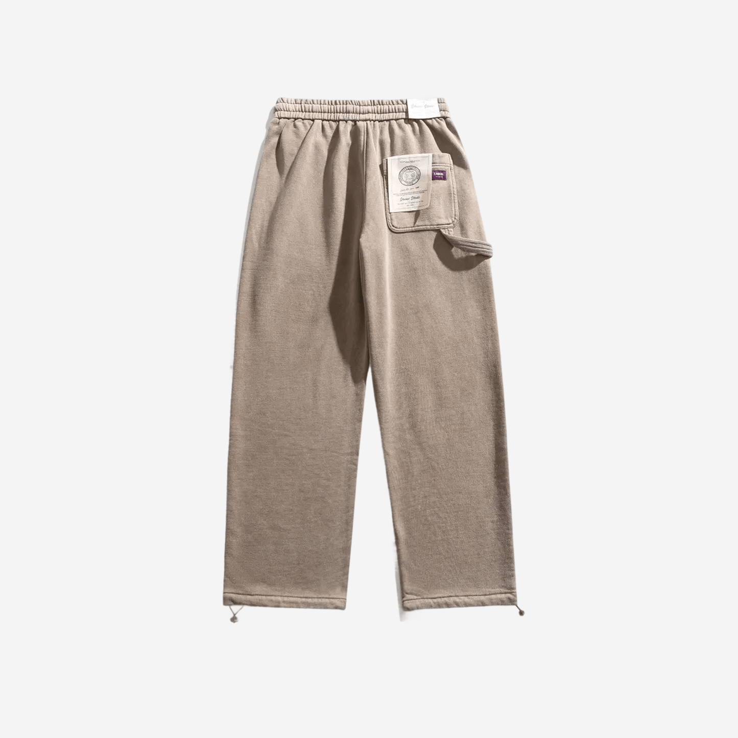 Свободные бежевые брюки из плотной ткани