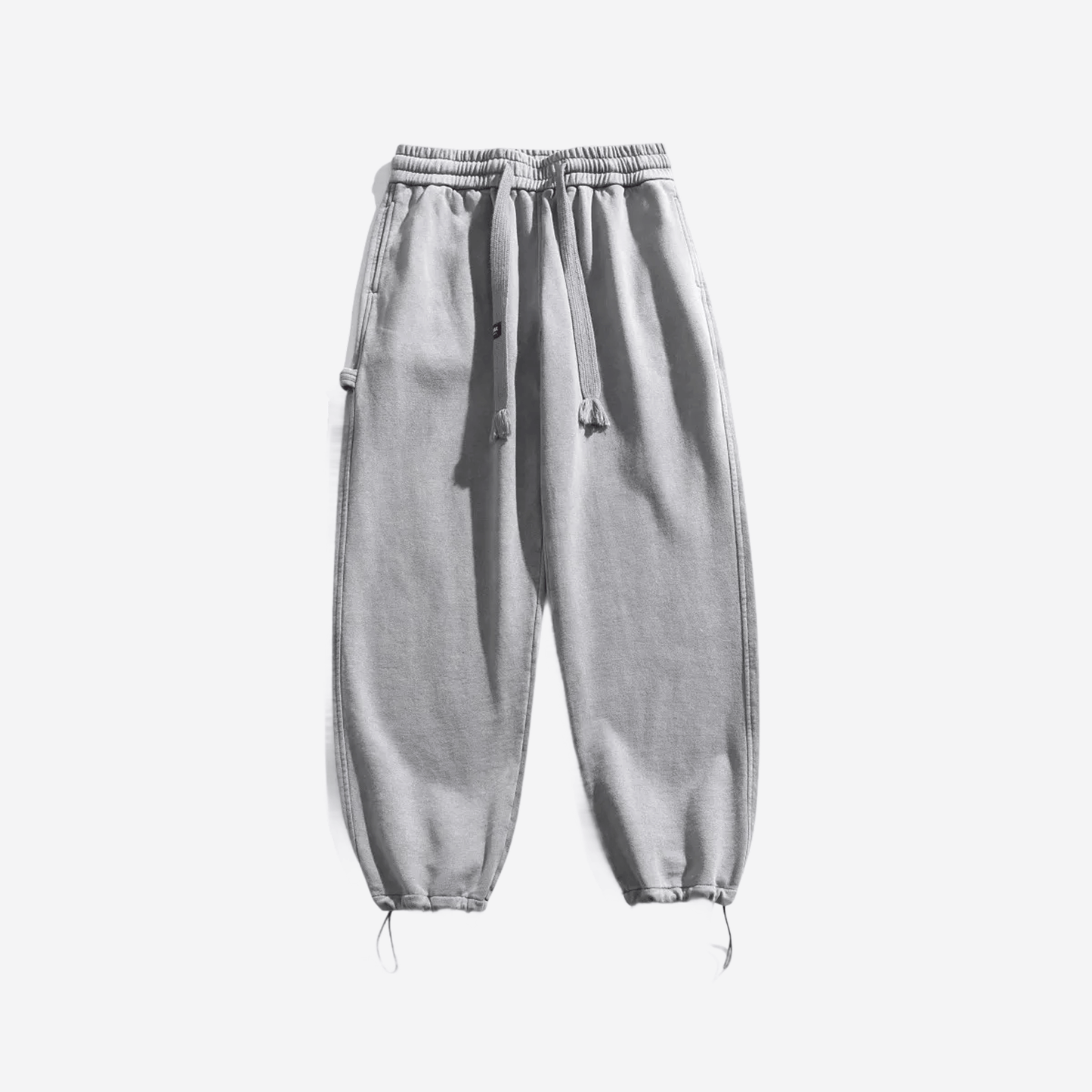 Свободные серые брюки из плотной ткани