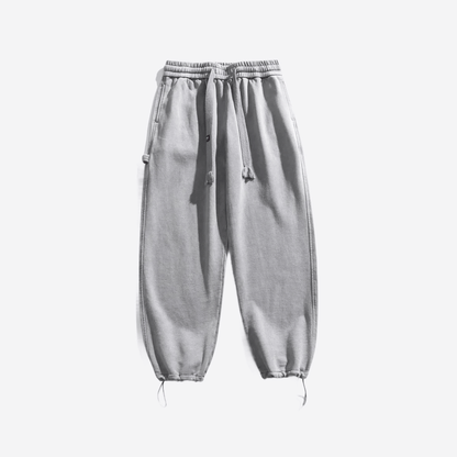Свободные серые брюки из плотной ткани