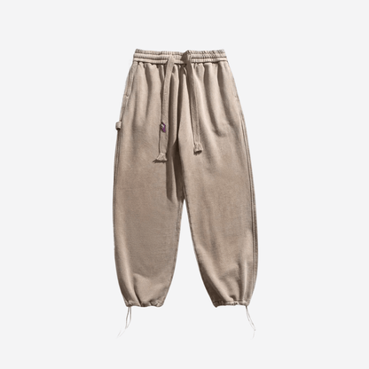 Свободные бежевые брюки из плотной ткани